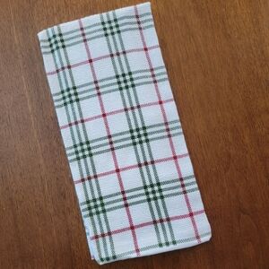 Red, white, and green plaid towel